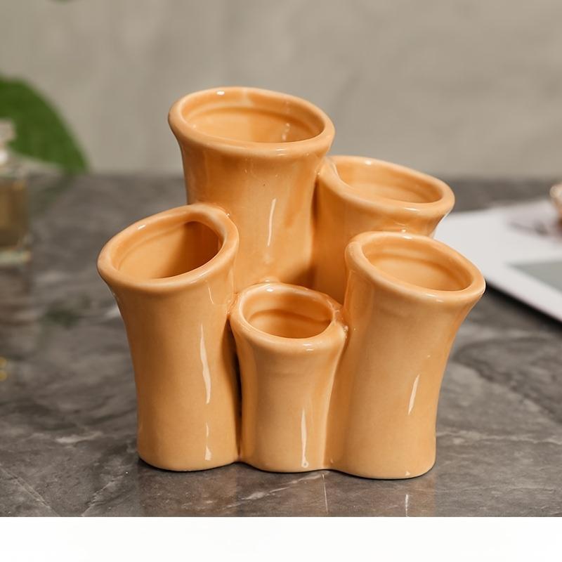 Креативная керамическая подставка для зубных щеток в виде морского коралла, органайзер для кистей для макияжа, многосекционный настольный ящик для хранения, декоративная подставка для ручек оранжевый
Креативная керамическая подставка для зубных щеток в виде морского коралла, органайзер для кистей для макияжа, многосекционный настольный ящик для хранения, декоративная подставка для ручек оранжевый