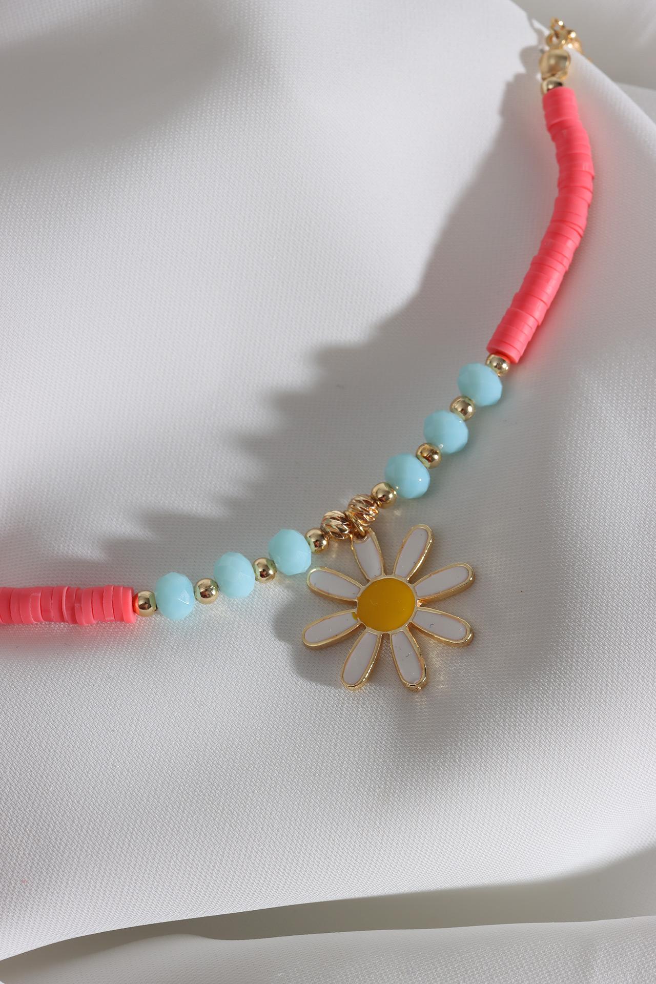 Розовый браслет Fimo с бисером и белой эмалью в виде ромашки
Розовый браслет Fimo с бисером и белой эмалью в виде ромашки