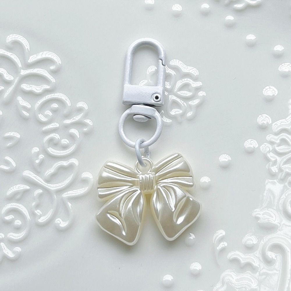 Маленький подарунок брелок з перлинним бантом, підвісна прикраса, сумка, підвіска, рюкзак, брелок для жінок, дівчат White
Маленький подарунок брелок з перлинним бантом, підвісна прикраса, сумка, підвіска, рюкзак, брелок для жінок, дівчат White