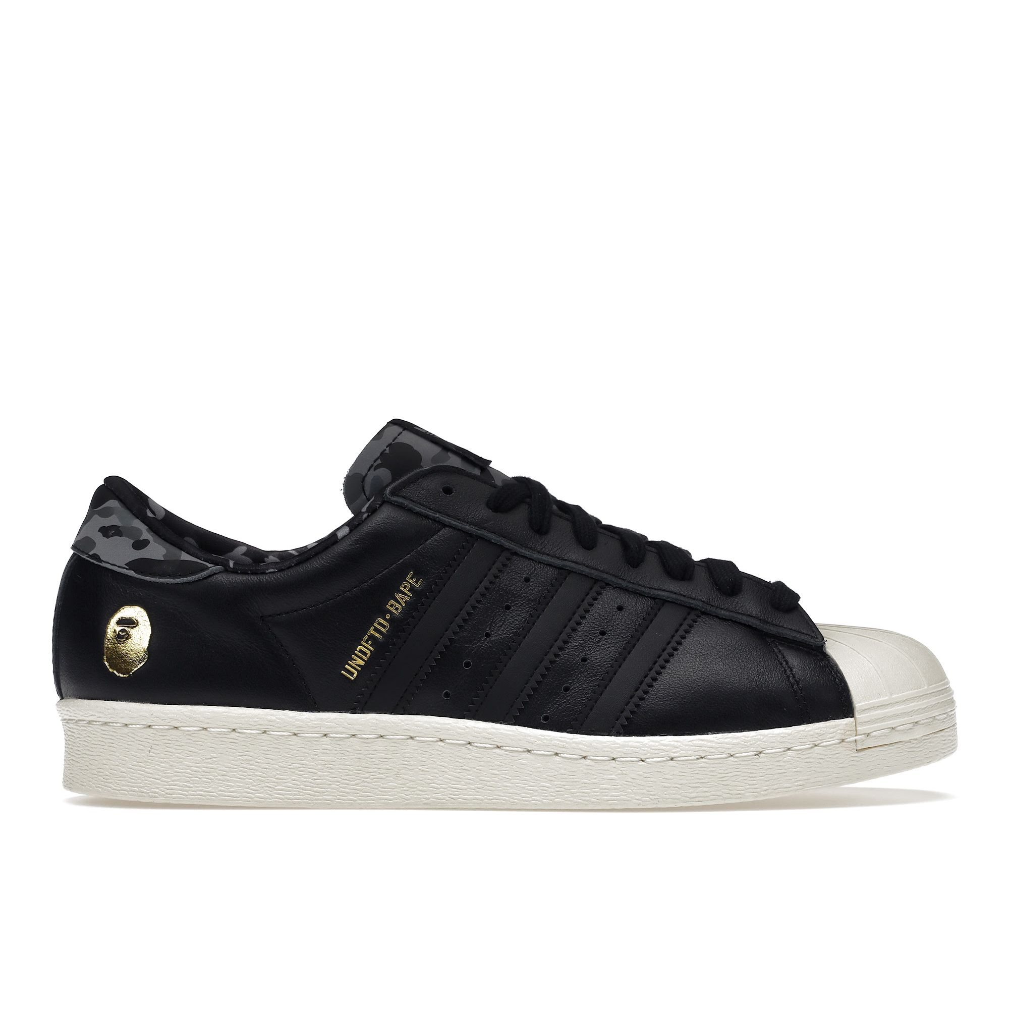 Adidas Черные мужские кроссовки Undefeated x A Bathing Ape x Superstars 80v Core-черный мел-белый B34291
Adidas Черные мужские кроссовки Undefeated x A Bathing Ape x Superstars 80v Core-черный мел-белый B34291