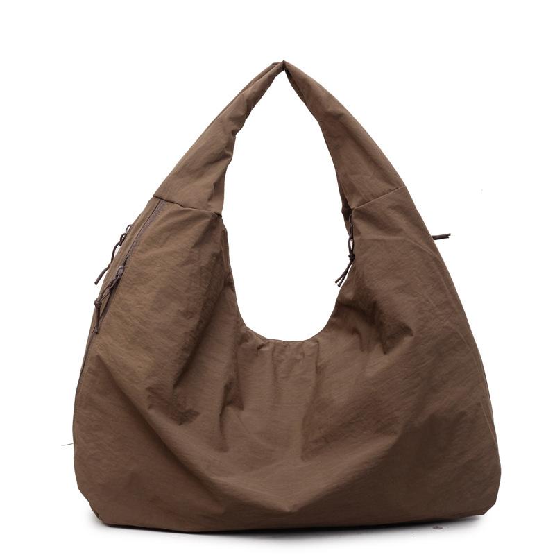 A New Summer Japanese Retro Large-pocket and Large-capacity Casual Sports Handbag 51*31*18 темно-коричневого кольору
A New Summer Japanese Retro Large-pocket and Large-capacity Casual Sports Handbag 51*31*18 темно-коричневого кольору