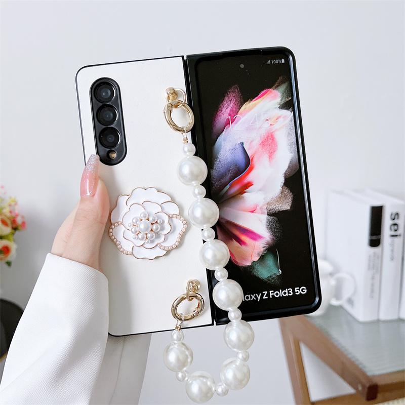Милый чехол для телефона с цепочкой и жемчугом и камелией для Samsung Galaxy Z Fold 4 3, кожаные чехлы с шарнирами для Z Flip 3 Flip 4 5G Funda
Милый чехол для телефона с цепочкой и жемчугом и камелией для Samsung Galaxy Z Fold 4 3, кожаные чехлы с шарнирами для Z Flip 3 Flip 4 5G Funda