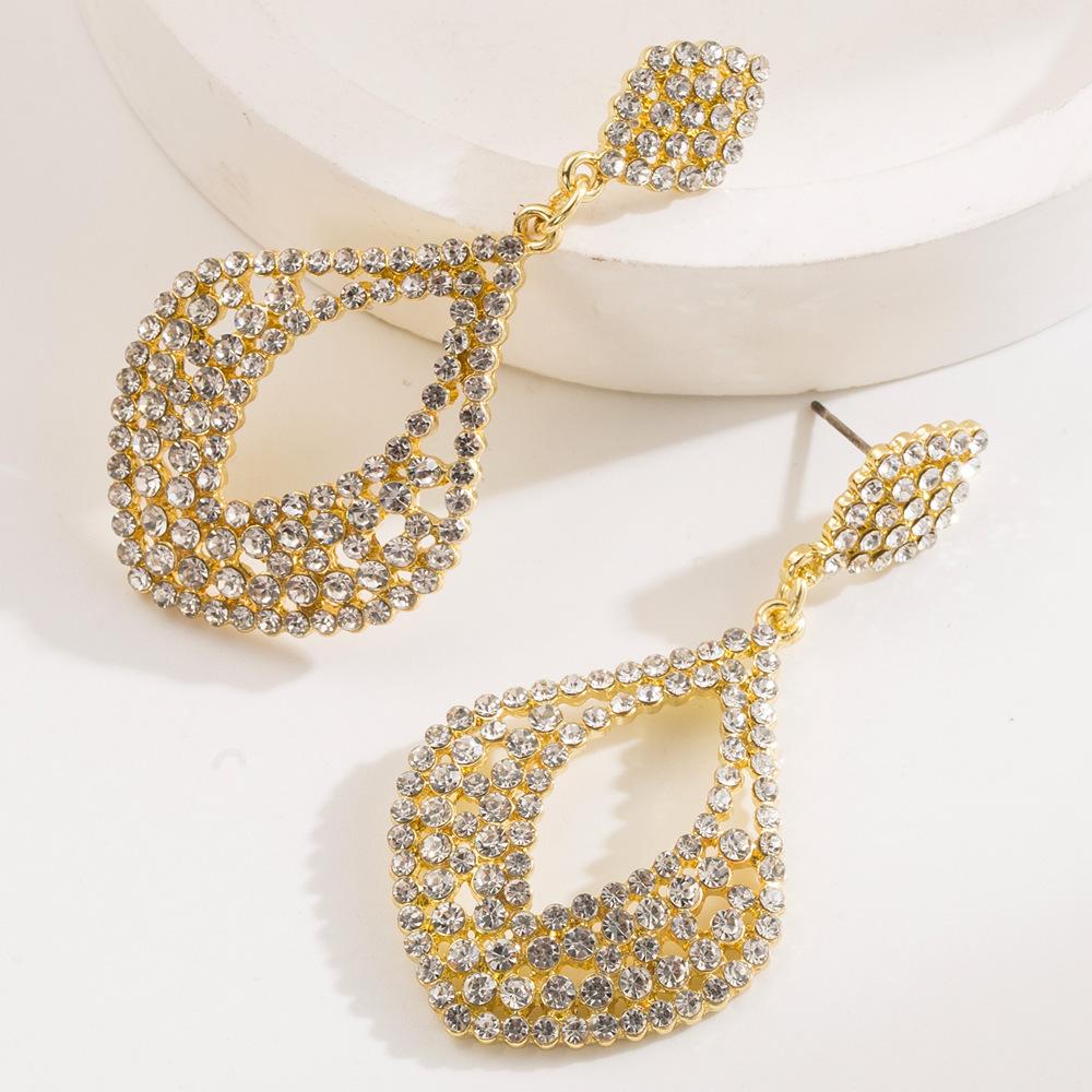 Metal Rhinestone Water Drop Geometric Dangle Earrings for Women New Charming Exaggerated Design Zircon Party Accessories
Metal Rhinestone Water Drop Geometric Dangle Earrings for Women New Charming Exaggerated Design Zircon Party Accessories