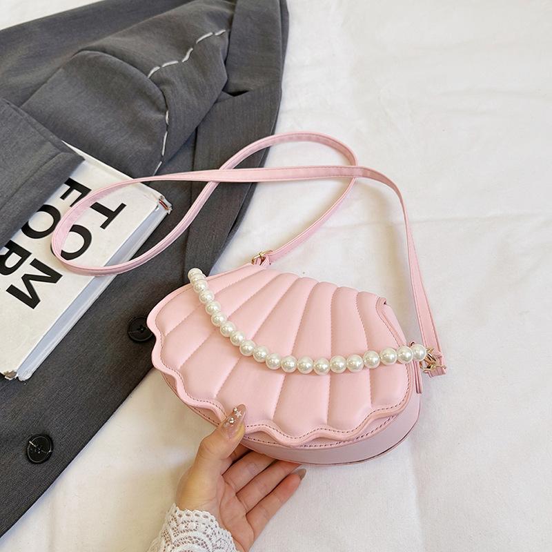 Популярная маленькая женская сумка 2025 года, новая модная универсальная сумка-мессенджер, высокое чувство иностранного стиля, нишевая сумка-ракушка розовый