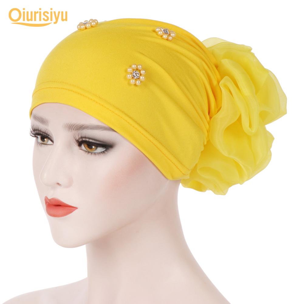 Женская шляпа-тюрбан с искусственным жемчугом и цветком
Женская шляпа-тюрбан с искусственным жемчугом и цветком