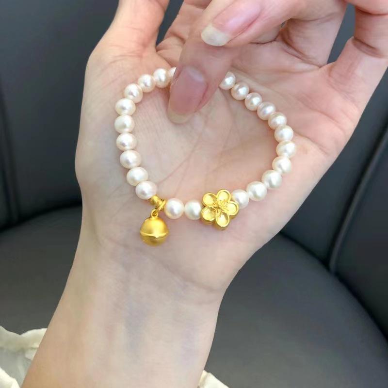 Vietnamese Gold Peach Blossom & Pearl Bracelet with Small Bell Pendant 5mm Pearl, Elastic Cord
Vietnamese Gold Peach Blossom & Pearl Bracelet with Small Bell Pendant 5mm Pearl, Elastic Cord