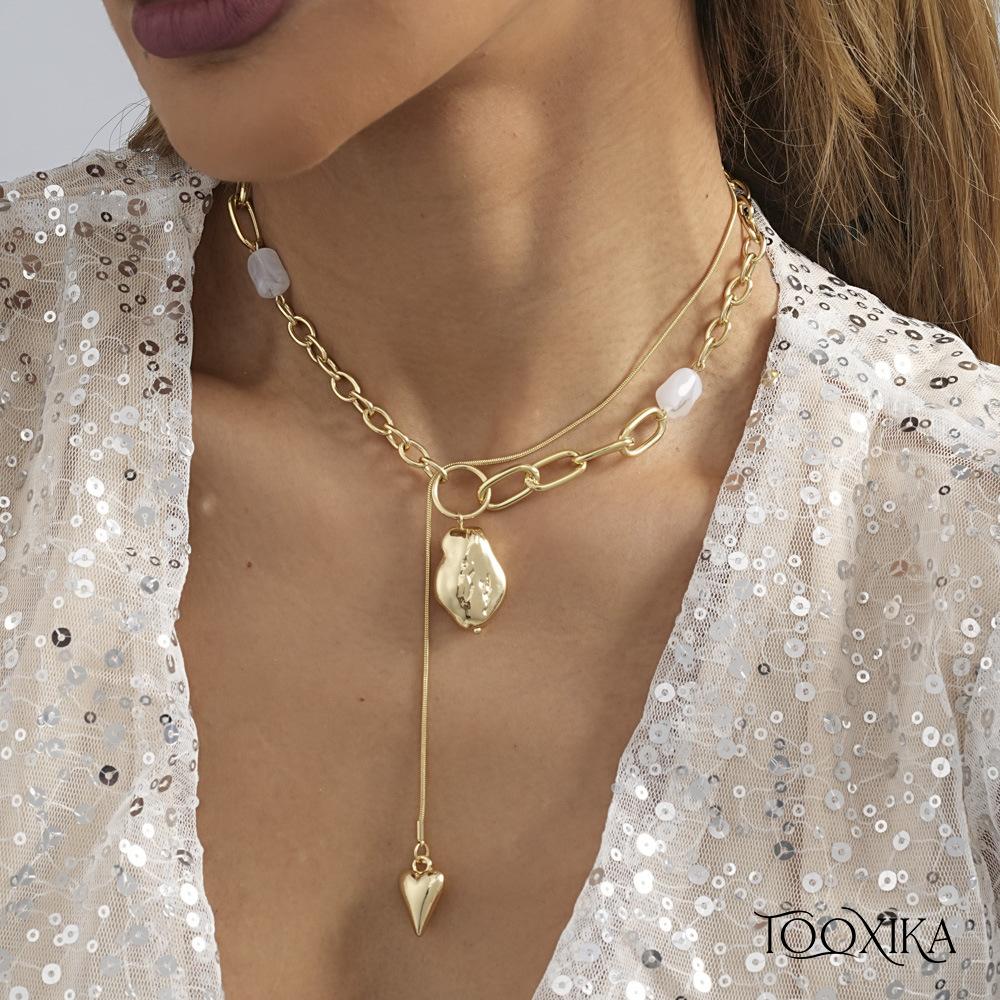Tooxika модное новое креативное длинное ожерелье с подвеской в виде сердца с кисточками простое ожерелье из натурального камня для женщин
Tooxika модное новое креативное длинное ожерелье с подвеской в виде сердца с кисточками простое ожерелье из натурального камня для женщин