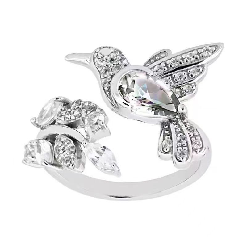 Hummingbird With Flower Ring Opening Colored Zircon Bird With Exquisite Personality opening adjustable
Hummingbird With Flower Ring Opening Colored Zircon Bird With Exquisite Personality opening adjustable
