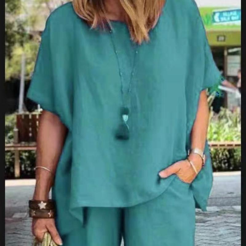 Summer Cotton Linen Suit Plus Size Casual Sportswear Temperament Fashion Loose Short-sleeved Top Shorts Two-piece Set 4XL зелений
Summer Cotton Linen Suit Plus Size Casual Sportswear Temperament Fashion Loose Short-sleeved Top Shorts Two-piece Set 4XL зелений