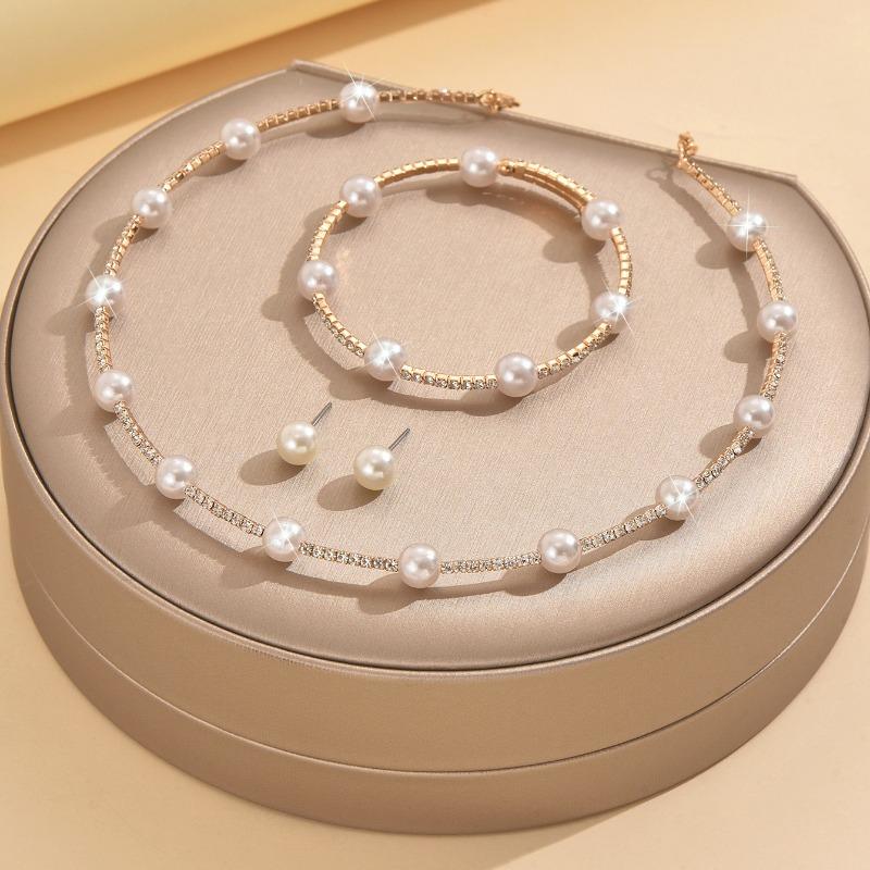 Meier Pearl and rhinestone choker necklace, bracelet, and earring set - fashion jewelry and accessories
Meier Pearl and rhinestone choker necklace, bracelet, and earring set - fashion jewelry and accessories