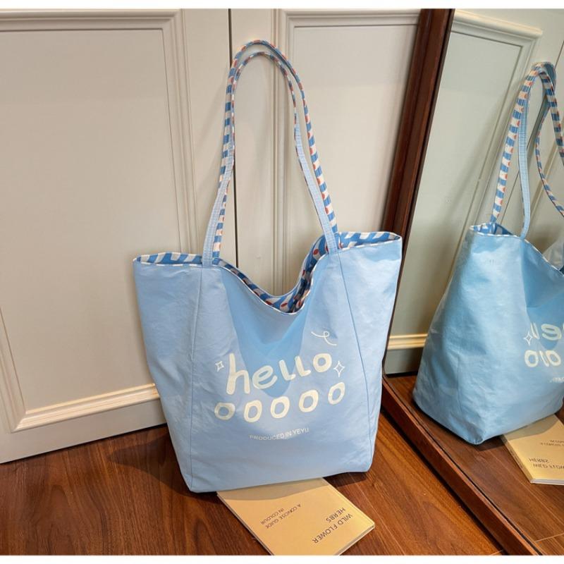 New fashionable large-capacity casual bag retro plaid double-sided back tote bag style student class bag синій
New fashionable large-capacity casual bag retro plaid double-sided back tote bag style student class bag синій