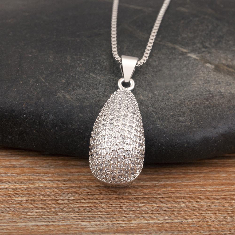 Nidin New Fashion Waterdrop Shape Hollow Design Charm Pendant Necklace For Women Men Shiny Crystal Zircon Jewelry Accessories срібний
Nidin New Fashion Waterdrop Shape Hollow Design Charm Pendant Necklace For Women Men Shiny Crystal Zircon Jewelry Accessories срібний