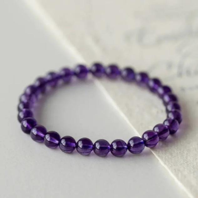 Аметистовий Мрійливий Фіолетовий Браслет з Намистин - Жіноча Буддійська Прикраса на Руку
Аметистовий Мрійливий Фіолетовий Браслет з Намистин - Жіноча Буддійська Прикраса на Руку