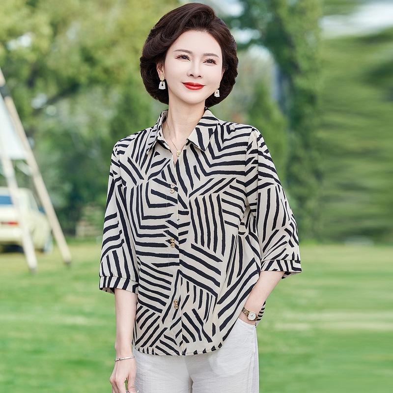 Summer Strip 3/4 Sleeve Shirt for Middle-Aged Women - Plus Size Slimming Top 3XL (120-135 jin)
Summer Strip 3/4 Sleeve Shirt for Middle-Aged Women - Plus Size Slimming Top 3XL (120-135 jin)