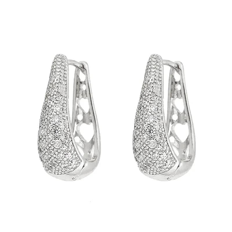 Huitan Hollow Pattern Hoop Earrings Luxury Waterdrop Shaped Noble Ear Piercing Accessories Shiny Cubic Zirconia Wedding Zircon
Huitan Hollow Pattern Hoop Earrings Luxury Waterdrop Shaped Noble Ear Piercing Accessories Shiny Cubic Zirconia Wedding Zircon