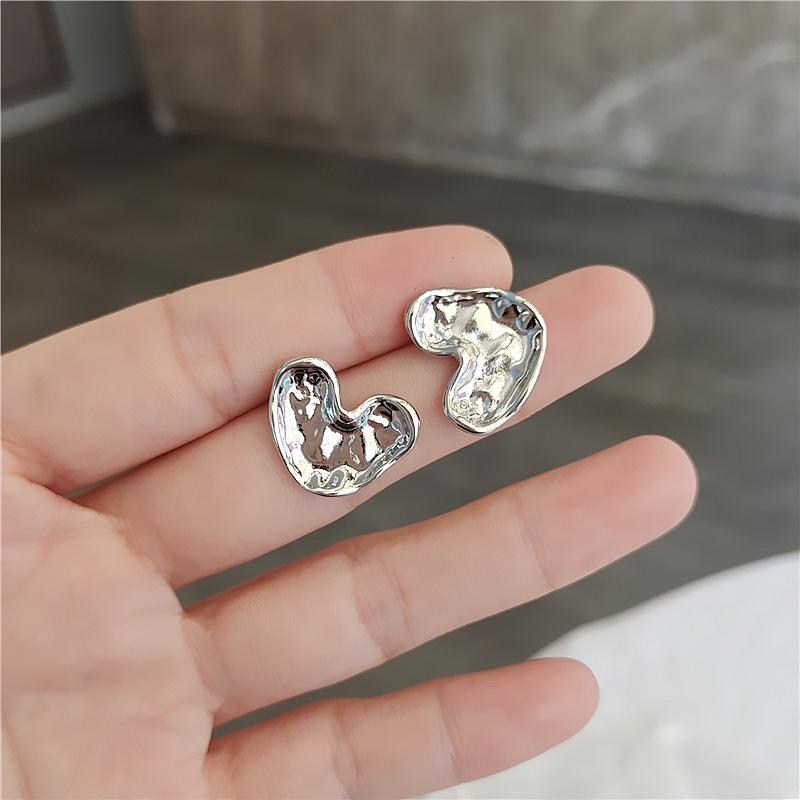 Versatile Liquid Heart Stud Earrings: Women s Fashion Earrings with Japanese-Korean Style and Unique Design.
Versatile Liquid Heart Stud Earrings: Women s Fashion Earrings with Japanese-Korean Style and Unique Design.