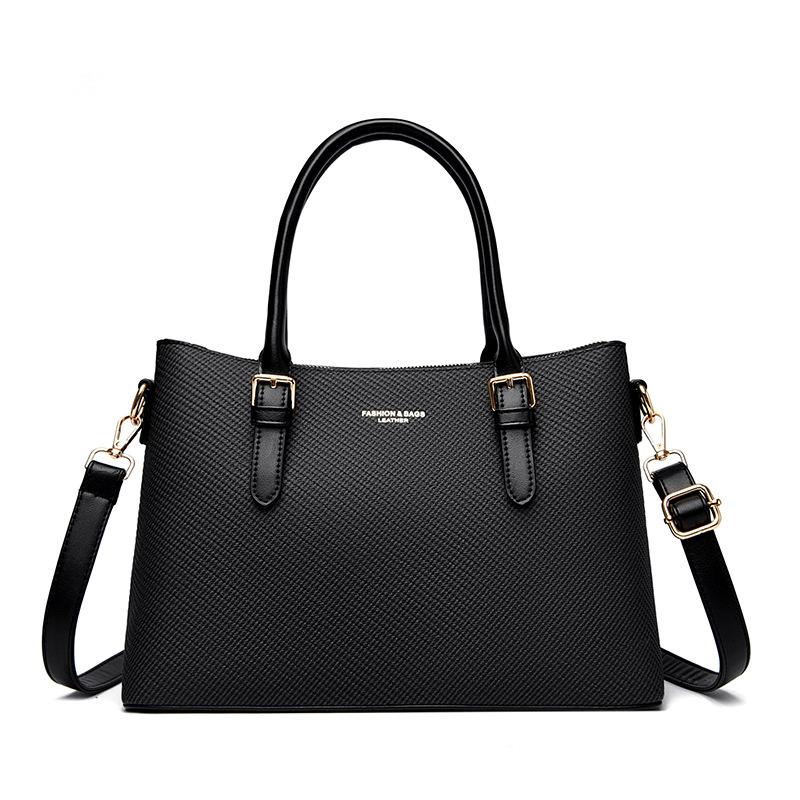 Handbag Fashion Contrasting Women s Bag Simple Large Capacity Commuting Tote Bag Temperament Middle-aged Mother Bag чорний
Handbag Fashion Contrasting Women s Bag Simple Large Capacity Commuting Tote Bag Temperament Middle-aged Mother Bag чорний