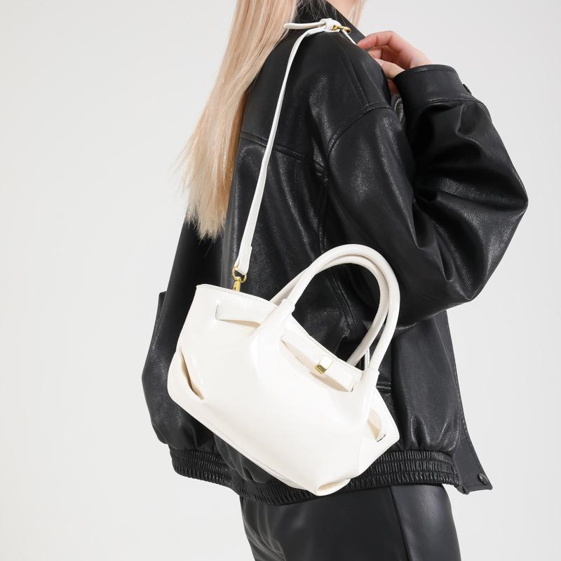 Spring new high-end textured locomotive bag niche original shoulder underarm bag crossbody bag білий
Spring new high-end textured locomotive bag niche original shoulder underarm bag crossbody bag білий