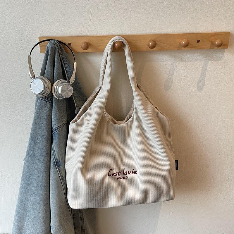 New Style Corduroy Top Handle Bag Large Capacity Winter Striped Embroidery Shoulder Bag Simple and Stylish Casual Commuting Bag
New Style Corduroy Top Handle Bag Large Capacity Winter Striped Embroidery Shoulder Bag Simple and Stylish Casual Commuting Bag