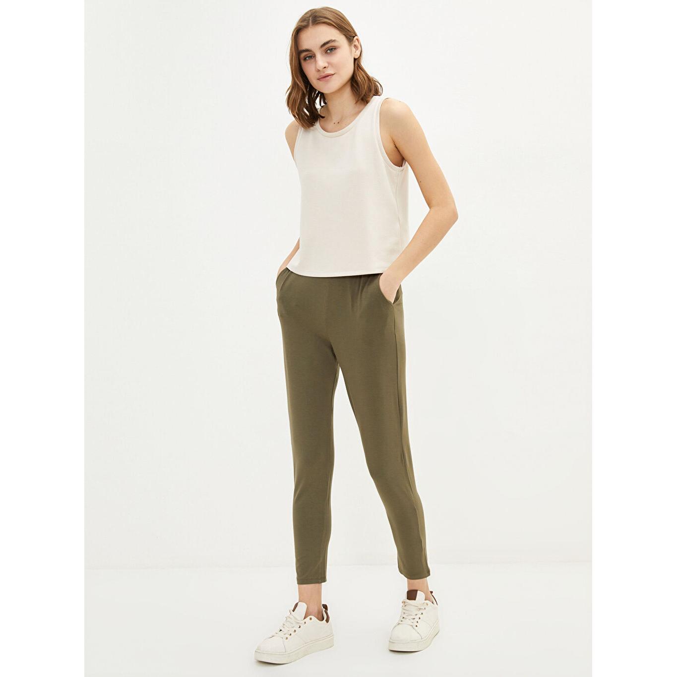 LCW BASIC Женские однотонные спортивные штаны с эластичной талией цвета хаки
LCW BASIC Женские однотонные спортивные штаны с эластичной талией цвета хаки