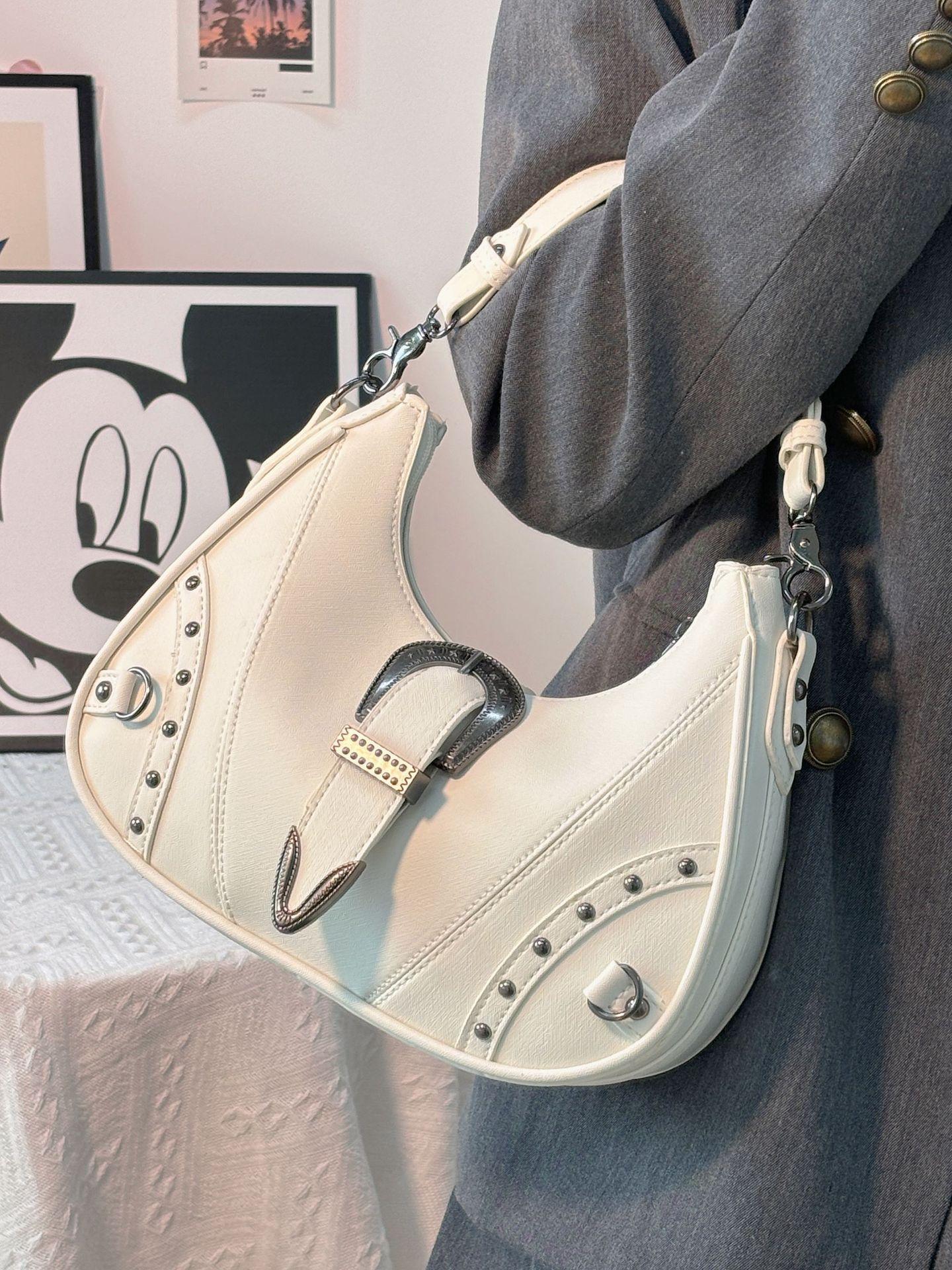 Niche design retro western old belt underarm bag rivet high-end feeling shoulder bag bag going out portable oblique span білий
Niche design retro western old belt underarm bag rivet high-end feeling shoulder bag bag going out portable oblique span білий