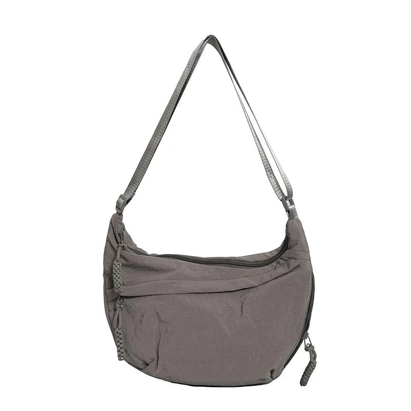 Solid color trendy shoulder bag, personalized multifunctional canvas bag, daily minimalist dumpling bag
Solid color trendy shoulder bag, personalized multifunctional canvas bag, daily minimalist dumpling bag