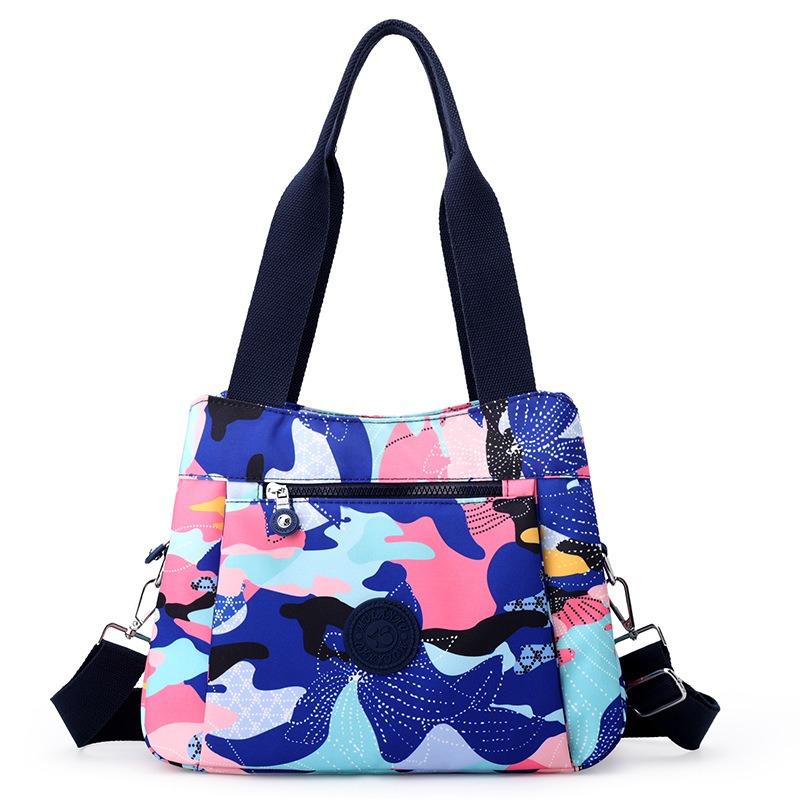 Ms. Toth portable shoulder bag autumn new fashion nylon large-capacity calico women s bag
Ms. Toth portable shoulder bag autumn new fashion nylon large-capacity calico women s bag