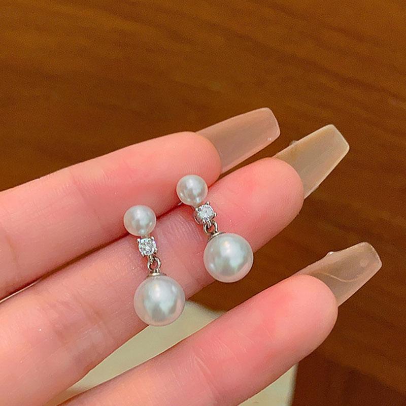 Simple style two white pearl earings stud light luxury Drop trend ball earrings for women party wedding romantic jewelry белый
Simple style two white pearl earings stud light luxury Drop trend ball earrings for women party wedding romantic jewelry белый