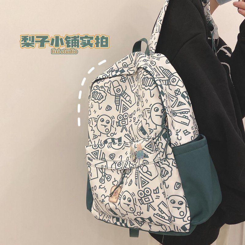 Cute graffiti personality niche schoolbag female Harajuku high school large capacity backpack college backpack
Cute graffiti personality niche schoolbag female Harajuku high school large capacity backpack college backpack