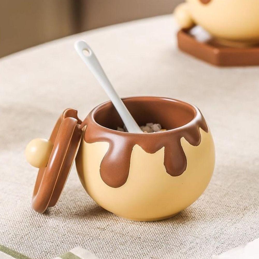 Cartoon Honey Jar Design Spice Jars with Spoon Condiment Pot Ceramic Seasoning Jar Restaurant
Cartoon Honey Jar Design Spice Jars with Spoon Condiment Pot Ceramic Seasoning Jar Restaurant