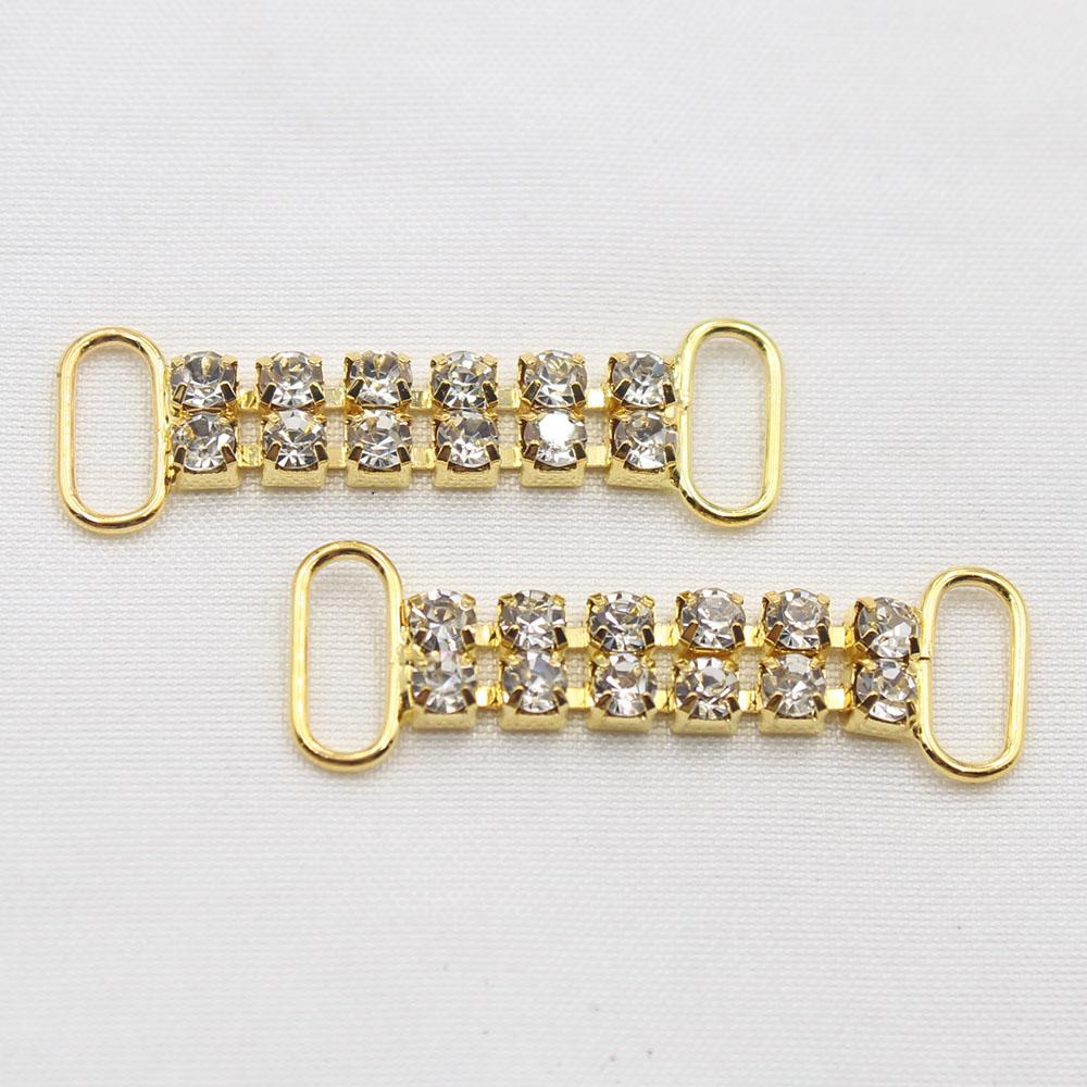 Shining 2 lines, 10 pieces, 12 * 38mm fully transparent crystal sequins, bikini buckle, metal chain, swimming decoration accesso
Shining 2 lines, 10 pieces, 12 * 38mm fully transparent crystal sequins, bikini buckle, metal chain, swimming decoration accesso