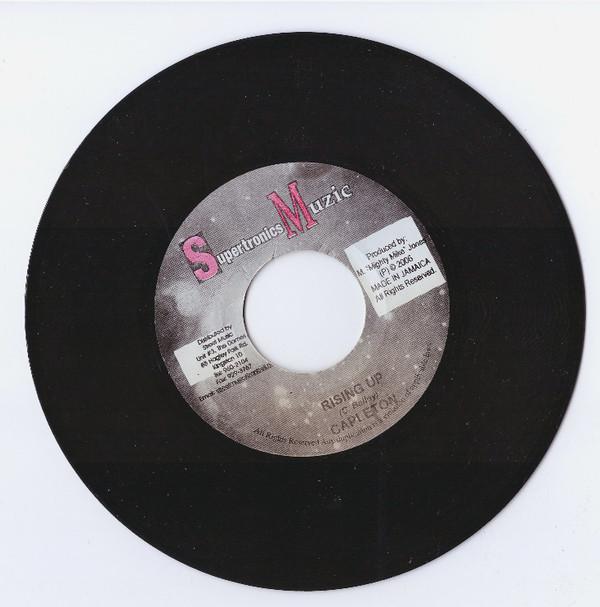 7inch Record CAPLETON - Rising Up NONE Supertronics Mu 2006 Jamaica Reggae, Ska & Dub Used
7inch Record CAPLETON - Rising Up NONE Supertronics Mu 2006 Jamaica Reggae, Ska & Dub Used