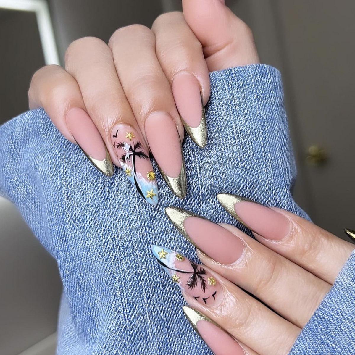 Ocean Style Gold French Tip Nails with Coconut Tree, Seagull, Starfish, and Seashell Designs
Ocean Style Gold French Tip Nails with Coconut Tree, Seagull, Starfish, and Seashell Designs