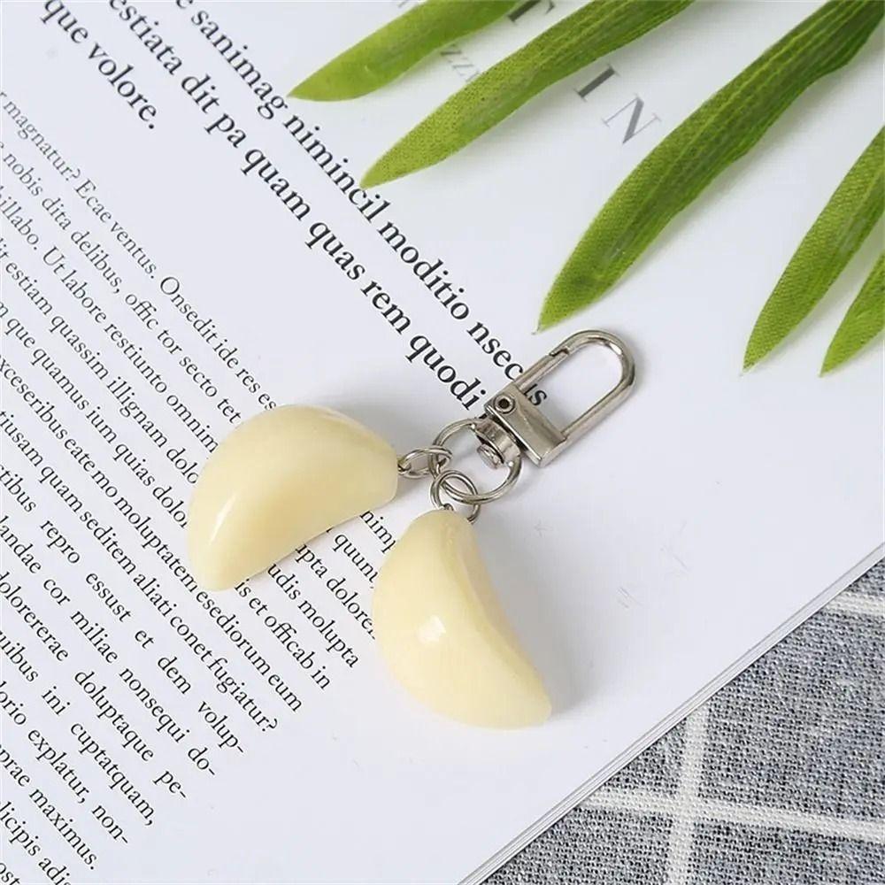 PVC Garlic Pendant Keychain Simulated Food Pendant Vegetable Shape Keyring Unisex gold buckle 
PVC Garlic Pendant Keychain Simulated Food Pendant Vegetable Shape Keyring Unisex gold buckle