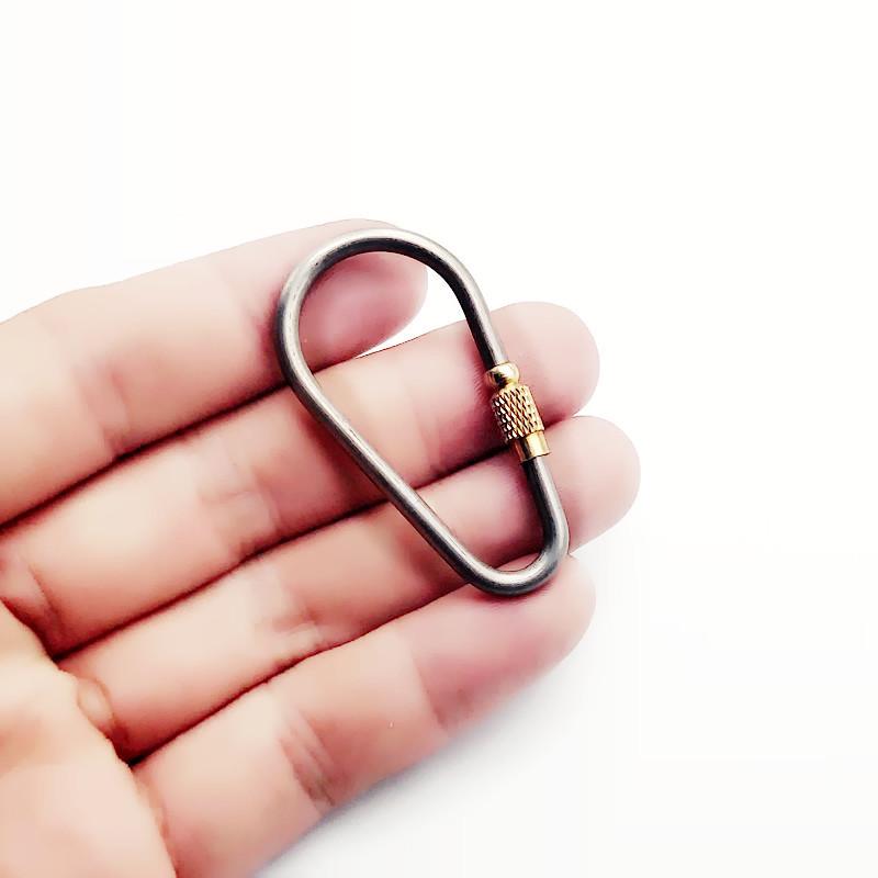 Retro Style Titanium Alloy Keychain: Outdoor EDC Carabiner with Quick Release Brass Buckle and Backpack Hanger
Retro Style Titanium Alloy Keychain: Outdoor EDC Carabiner with Quick Release Brass Buckle and Backpack Hanger