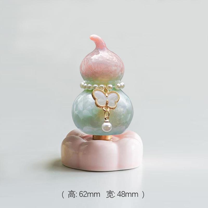 Crystal Glaze Gourd Rotating Music Ornament Pure Ceramic Base Mini Gourd Desktop Ornament Car Ornament
Crystal Glaze Gourd Rotating Music Ornament Pure Ceramic Base Mini Gourd Desktop Ornament Car Ornament