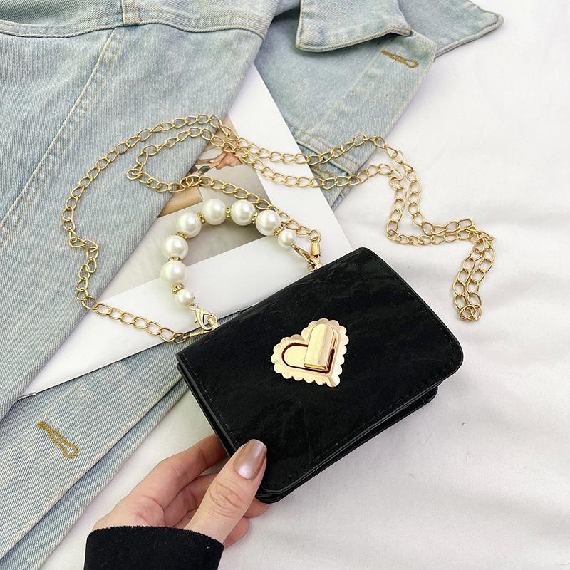 Нишевая сумка высокой ценности женская 2025 осень новая жемчужный дизайн мини маленькая портативная сумка-мессенджер чёрный
Нишевая сумка высокой ценности женская 2025 осень новая жемчужный дизайн мини маленькая портативная сумка-мессенджер чёрный