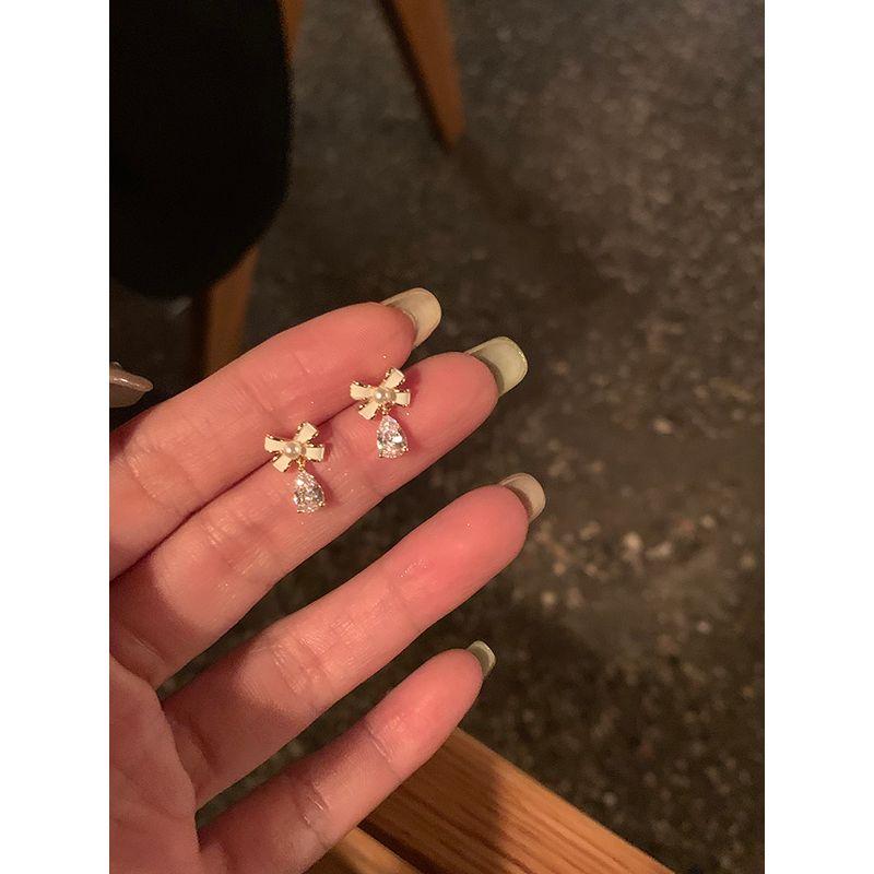 Niche Style Doctrine Bow Stud Earrings Female Classy Peach Tea Pair of 925 silver needles
Niche Style Doctrine Bow Stud Earrings Female Classy Peach Tea Pair of 925 silver needles