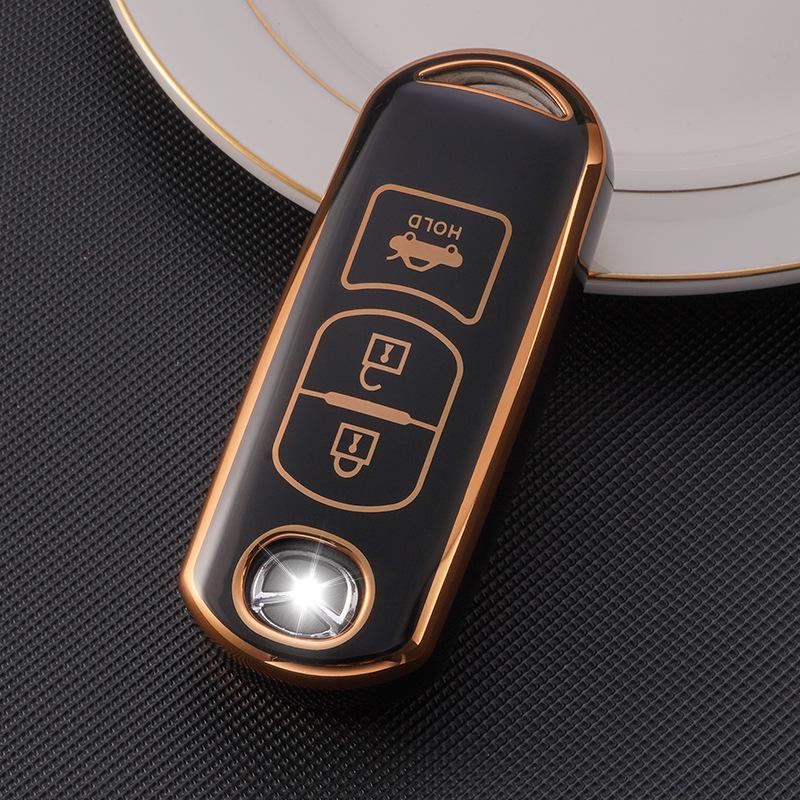 Gold-Rimmed Key Cover for 2-Button/3-Button Mazda Models CX-30, Atez, CX-4, CX-5, CX-8
Gold-Rimmed Key Cover for 2-Button/3-Button Mazda Models CX-30, Atez, CX-4, CX-5, CX-8