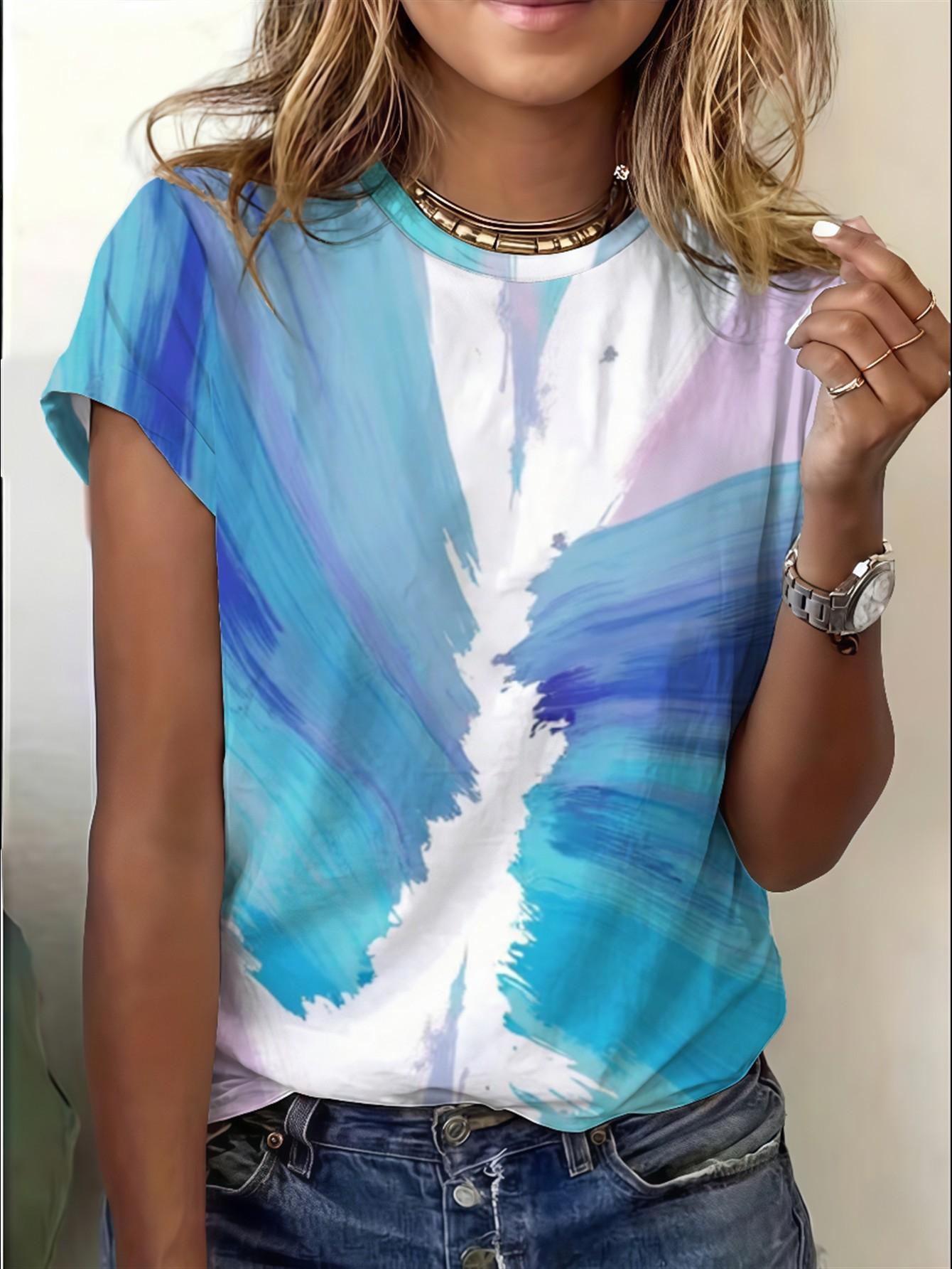 Women s loose-fitting round-neck T-shirt with abstract fluid brushstroke print and cool-toned design. XXS
Women s loose-fitting round-neck T-shirt with abstract fluid brushstroke print and cool-toned design. XXS