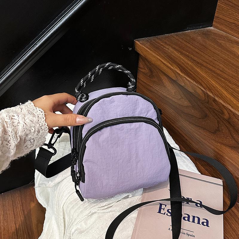 Lightweight messenger bag for outdoor travel, high-end sense of light luxury, practical walking, walking the baby, portable waterproof nylon bag фиолетовый
Lightweight messenger bag for outdoor travel, high-end sense of light luxury, practical walking, walking the baby, portable waterproof nylon bag фиолетовый