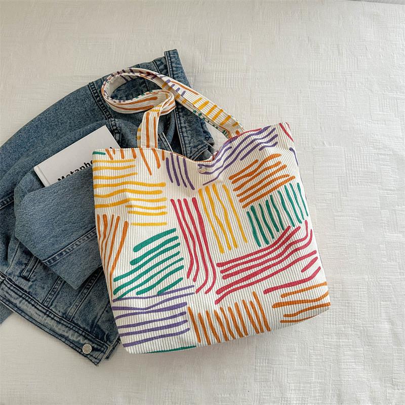 Trendy Medium Size Tote Bag With Unique Car Line Detailing And Magnetic Closure
Trendy Medium Size Tote Bag With Unique Car Line Detailing And Magnetic Closure