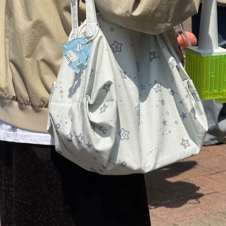 Korean niche star large-capacity travel tote bag 2025 new commuter Boston portable shoulder armpit bag
Korean niche star large-capacity travel tote bag 2025 new commuter Boston portable shoulder armpit bag