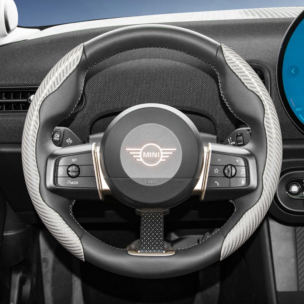 Suitable for Mini Carbon Fiber Texture Steering Wheel Cover with Segmented Quick-Release Design, Durable, for Models Such as Cooper 3-Door
Suitable for Mini Carbon Fiber Texture Steering Wheel Cover with Segmented Quick-Release Design, Durable, for Models Such as Cooper 3-Door
