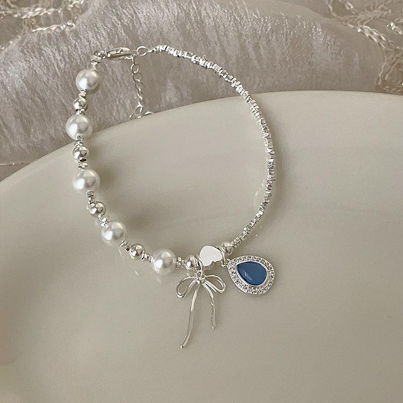 Аквамариновый сломанный серебряный бант с жемчугом Браслет Девушки чувствуют себя милыми и нежными Индивидуальность Универсальный браслет Ювелирные изделия
Аквамариновый сломанный серебряный бант с жемчугом Браслет Девушки чувствуют себя милыми и нежными Индивидуальность Универсальный браслет Ювелирные изделия