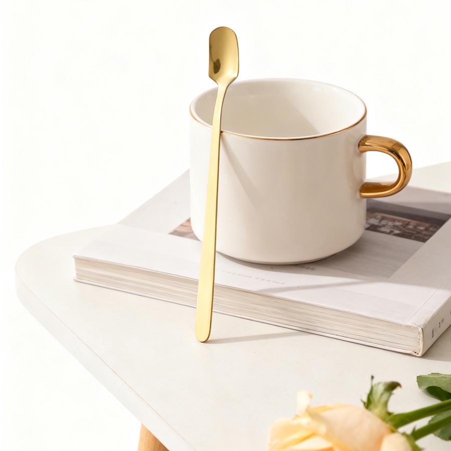 Gold Nordic Style Square Head Spoon: Simple, Luxurious Oatmeal & Cereal Spoon for Hotels & Restaurants.
Gold Nordic Style Square Head Spoon: Simple, Luxurious Oatmeal & Cereal Spoon for Hotels & Restaurants.