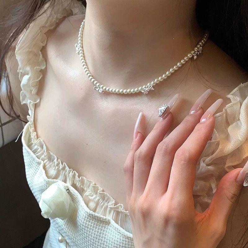 Pearl bow tassel necklace fashion versatile high sense collarbone chain light luxury niche temperament jewelry women
Pearl bow tassel necklace fashion versatile high sense collarbone chain light luxury niche temperament jewelry women