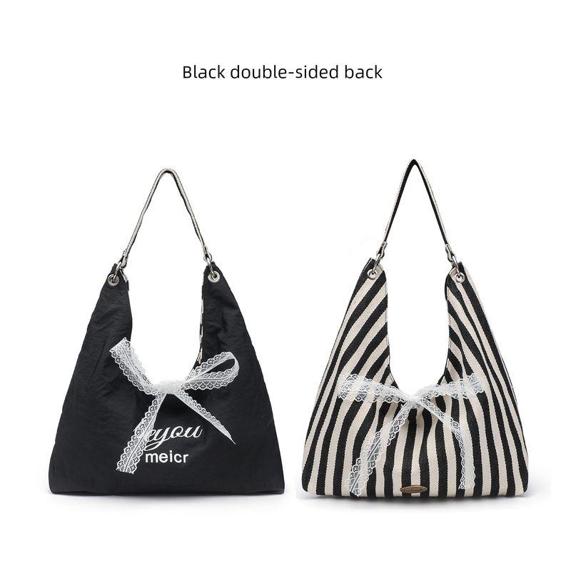Double-Sided Red Stripes Canvas Bag Female Summer 2025 New Arrival Trendy Printed Shoulder Bag Student Class Bag Black Stripes double bread + silk scarf
Double-Sided Red Stripes Canvas Bag Female Summer 2025 New Arrival Trendy Printed Shoulder Bag Student Class Bag Black Stripes double bread + silk scarf