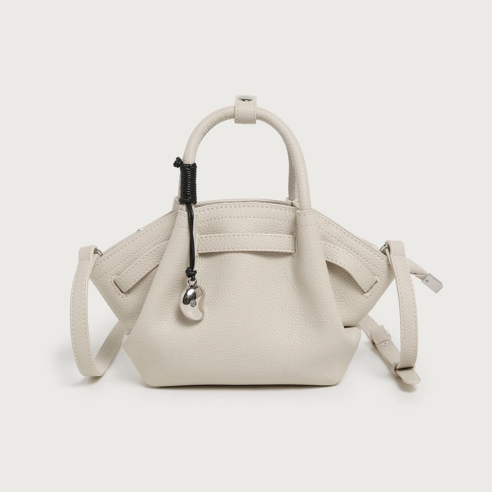 Elegant Crossbody Cowhide Dumpling Bag 18cm*9cm*17cm білий
Elegant Crossbody Cowhide Dumpling Bag 18cm*9cm*17cm білий