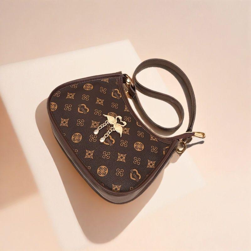 Милая сумка через плечо с подвеской, модная ретро-принтованная ручная сумка-подмышка, весна 2025, новая компактная сумка для мобильного телефона для женщин темно-коричневого